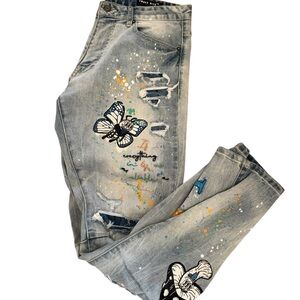 Stylish Gray Distressed Jeans with Butterfly Art